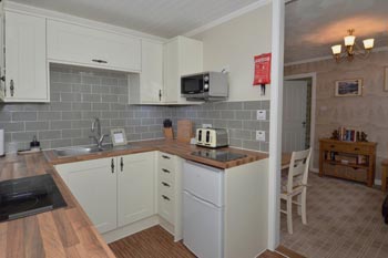 Kitchen with under counter fridge / freezer